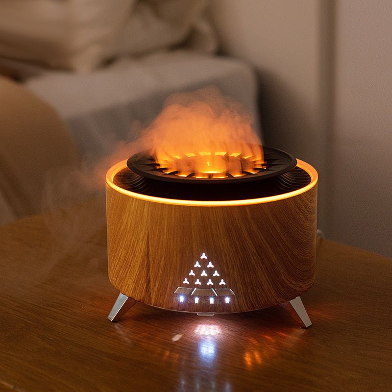 https://cdn.shopify.com/s/files/1/0777/4122/8329/files/wholesale-new-arrival-remote-control-volcano-humidifier-diffuser-wholesale-fire-flame-diffuser-with-lights-830152.jpg?v=1741208400